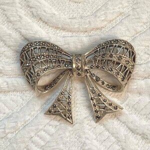 vintage sterling filigree bow brooch with marcasites